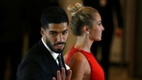 Tampak pula Luis Suarez, rekan satu tim Messi di Barcelona, menghadiri acara bersama sang istri (Foto: REUTERS/Marcos Brindicci)