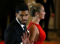 Tampak pula Luis Suarez, rekan satu tim Messi di Barcelona, menghadiri acara bersama sang istri (Foto: REUTERS/Marcos Brindicci)