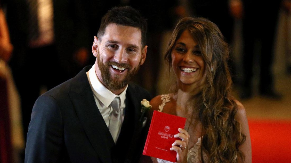 Lionel Messi dan Antonella Roccuzzo dalam resepsi pernikahan mereka (Foto: REUTERS/Marcos Brindicci)