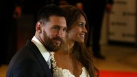 Dan inilah pasangan yang jadi pusat perhatian utama: Lionel Messi dan Antonella Roccuzzo (Foto: REUTERS/Marcos Brindicci)