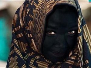 Tampilkan Wanita Berkerudung dengan Wajah Gosong, Iklan Apotek Ini Dikritik