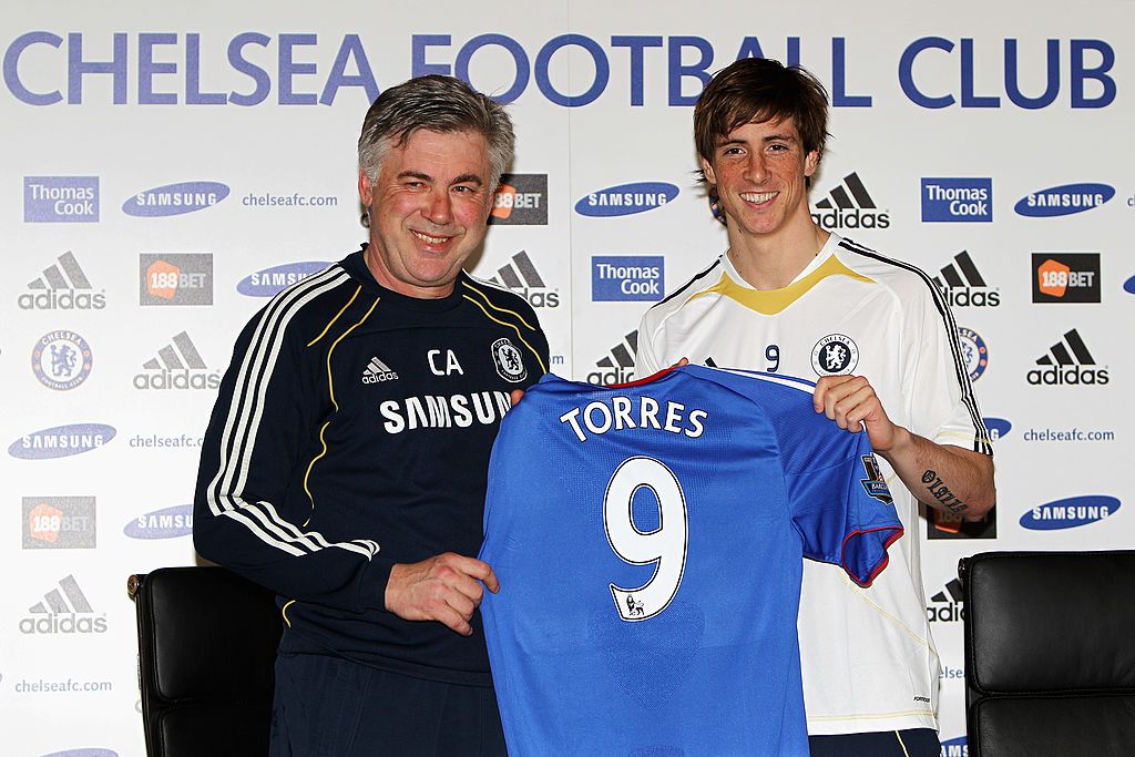COBHAM, ENGLAND - FEBRUARY 04:  Manager Carlo Ancelotti (L) and Fernando Torres pose for the media at the Chelsea Press Conference on February 4, 2011 in Cobham, England.  (Photo by Dean Mouhtaropoulos/Getty Images)