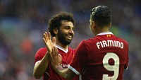 Salah tampil dalam 45 menit pertama bersama pemain-pemain kunci Liverpool dalam laga itu. Dia natarnya, Simon Mignolet, Joel Matip, Georginio Wijnaldum, dan Adam Lallana. (Alex Livesey/Getty Images)