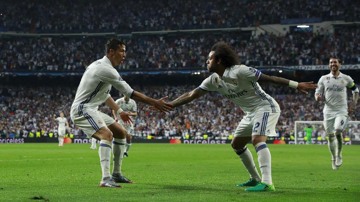 Cristiano Ronaldo dan Marcelo (Gonzalo Arroyo Moreno/Getty Images)