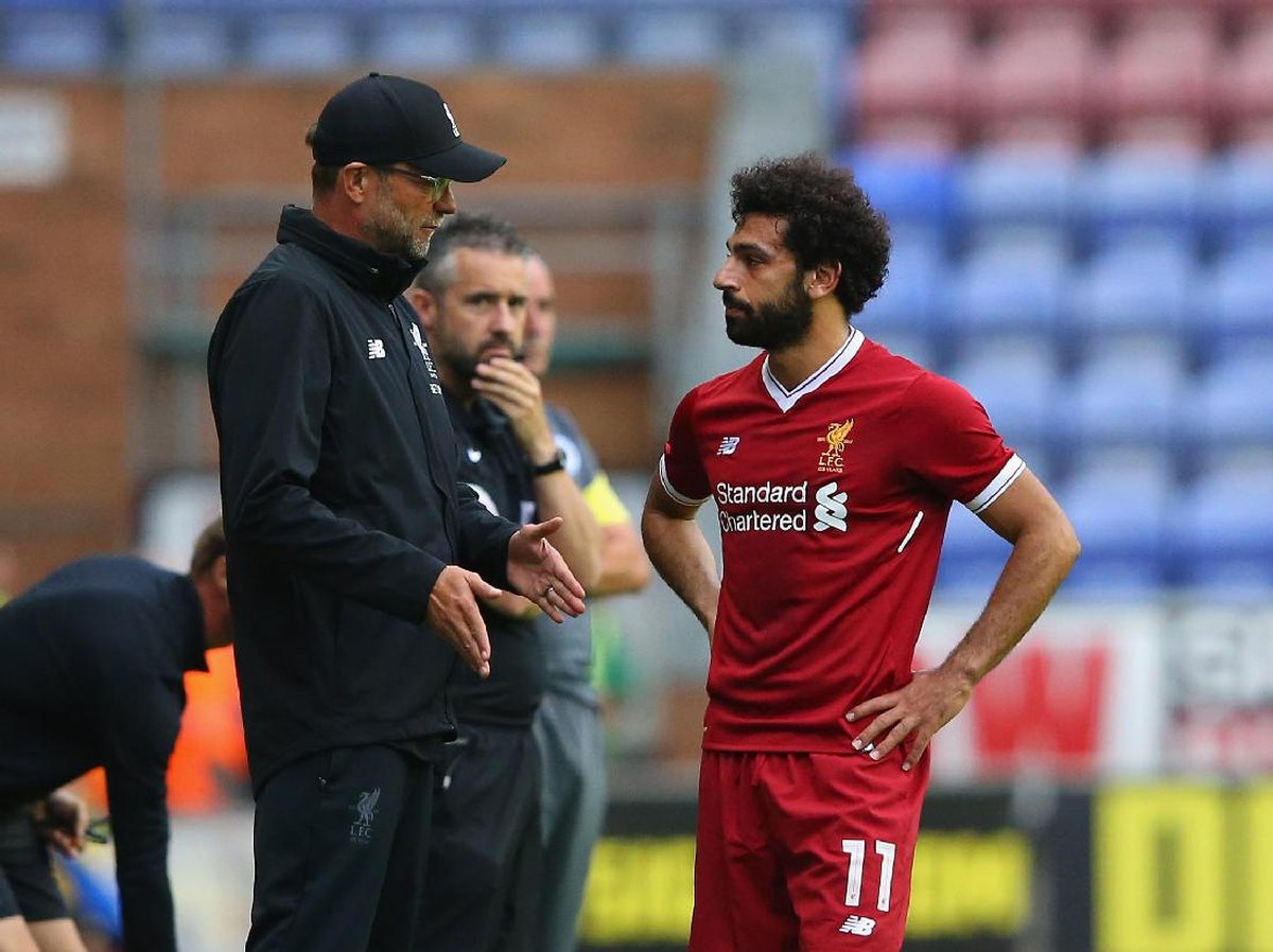 Juergen Klopp bersama Mohamed Salah (Alex Livesey/Getty Images)