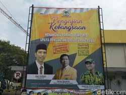 Novanto Tersangka, Baliho Jokowi Tetap Terpasang di Kantor Golkar
