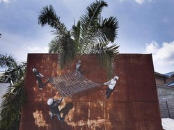 Mural-mural di Sumatera Kritik Industri Kelapa Sawit
