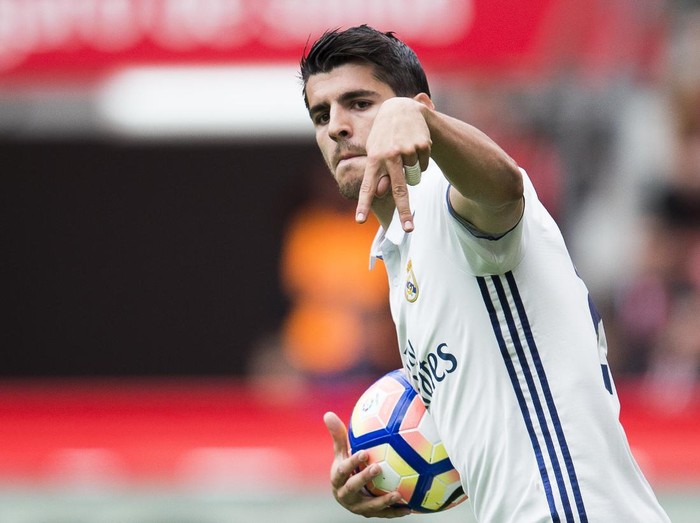 GIJON, SPAIN - APRIL 15:  Alvaro Morata of Real Madrid celebrates after scoring his team's second goal during the La Liga match between Real Sporting de Gijon and Real Madrid at Estadio El Molinon on April 15, 2017 in Gijon, Spain.  (Photo by Juan Manuel Serrano Arce/Getty Images)