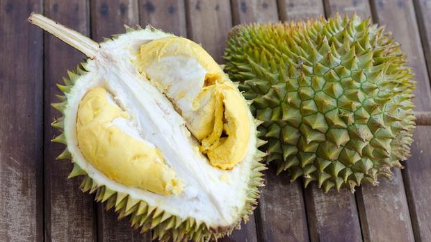 Durian fresh yellow  fruit on wooden background
