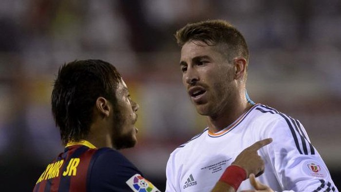 Barcelonas Brazilian forward Neymar da Silva Santos Junior (L) vies with Real Madrids defender Sergio Ramos during the Spanish Copa del Rey (Kings Cup) final 
