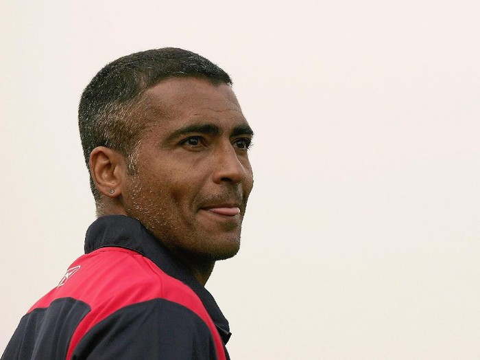 GOSFORD, AUSTRALIA - NOVEMBER 25:  Romario of Adelaide United looks at the field before the start of play in the round fourteen Hyundai A-League match between the Central Coast Mariners and Adelaide United at Bluetongue Central Coast Stadium November 25, 2006 in Gosford, Australia.      (Photo by Mark Kolbe/Getty Images)
