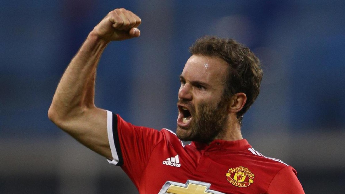 Juan Mata bertekad mengantarkan MU juara liga musim ini. (Ian Walton/Getty Images)