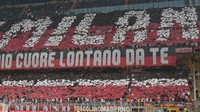 Tampil di kandang sendiri, Milan mendapat dukungan penuh dari suporter. Sebanyak 65.763 penonton memenuhi San Siro. Foto: Emilio Andreoli/Getty Images