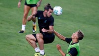 Gareth Bale berharap banyak diturunkan pada laga ini. Dalam beberapa laga penting Madrid musim lalu, dia kerap tidak dimainkan dengan beragam alasan. (Foto: REUTERS/Peter Cziborra)