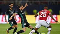 Madrid memulai dengan dominan dan menekan MU. MU pun kesulitan mengembangkan permainan dan terdesak sejak awal pertandingan. (Foto: Getty Images Sport)