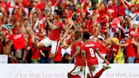 Perayaan gol Septian David menjadi klimaks untuk Indonesia. Tim besutan Luis Milla itu mengakhiri laga dengan skor 1-1. (Foto: Manan Vatsyayana/AFP)