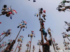 Sejarah Lomba Makan Kerupuk dan Panjat Pinang yang Kini Hilang Saat Pandemi Sejarah Lomba Makan Kerupuk dan Panjat Pinang yang Kini Hilang Saat Pandemi