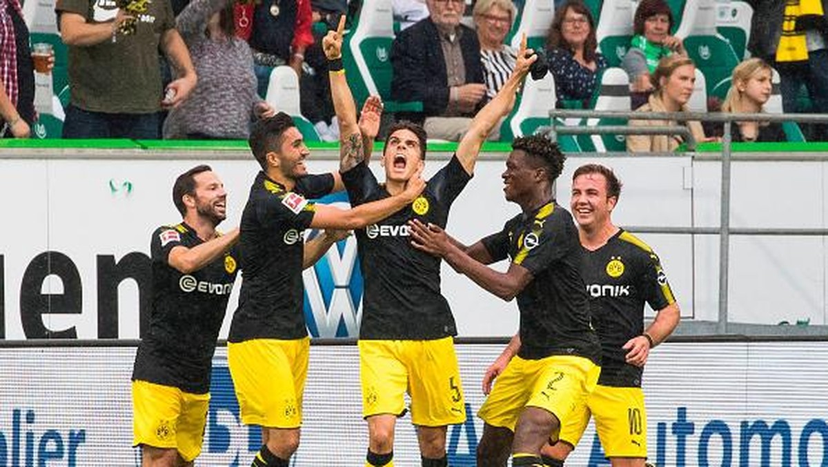 Dortmund menang 3-0 di kandang Wolfsburg (Odd Andersen/AFP)