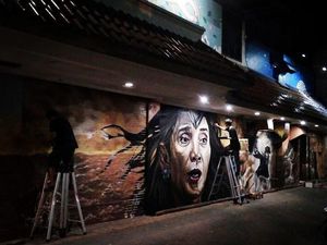 Mural Bu Susi ala Wonder Woman Viral di Medsos Mural Bu Susi ala Wonder Woman Viral di Medsos