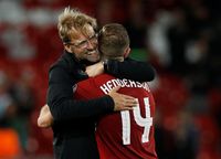Juergen Klopp yang begitu dekat dengan para pemainnya