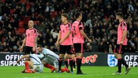 Pertandingan melawan Skotlandia pada 11 November 2016 menjadi pertandingan terakhir Rooney bersama Inggris. Pasca Euro 2016, dia banyak ditepikan Gareth Southgate (Foto: Richard Heathcote/Getty Images)