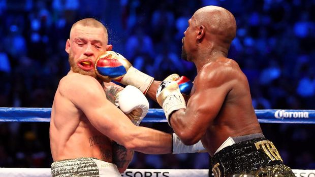 Floyd Mayweather Jr. berhasil menang KO atas Conor McGregor.