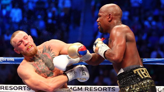 Conor McGregor menyampaikan keinginannya bisa tanding ulang lawan Floyd Mayweather di ring tinju (Foto: Reuters)