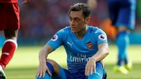 Kontrak Mesut Oezil di Arsenal akan habis tahun depan. Pada satu ketika ia pun sempat dihubungkan dengan Barcelona walaupun kini masih tetap bersama The Gunners. (Foto: Carl Recine/Action Images via Reuters)