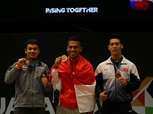 Deni Raih Emas dari Angkat Besi Kelas 69kg Deni Raih Emas dari Angkat Besi Kelas 69kg