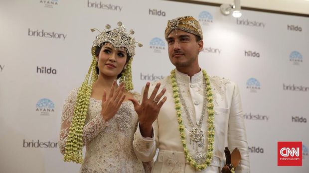 Raisa dan Hamish resmi menikah akhir pekan lalu.