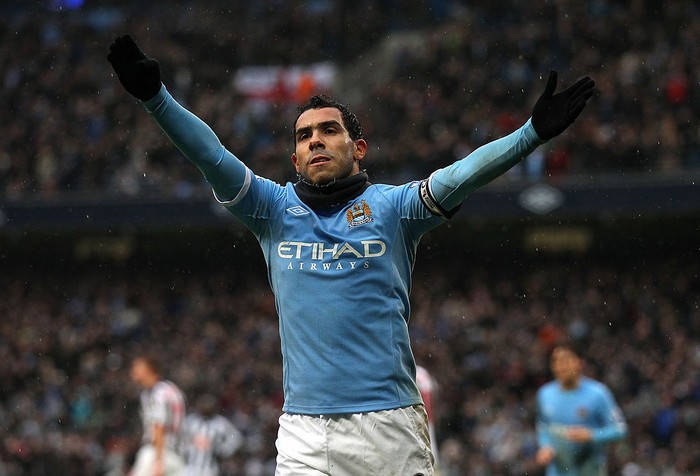 Carlos Tevez MANCHESTER, ENGLAND - FEBRUARY 05: Carlos Tevez of Manchester City celebrates after scoring his third goal during the Barclays Premier League match between Manchester City and West Bromwich Albion at the City of Manchester Stadium on February 5, 2011 in Manchester, England. (Photo by Alex Livesey/Getty Images)