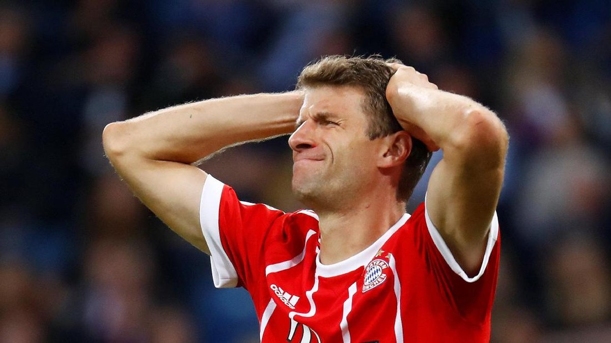 Thomas Mueller mengalami cedera paha dan harus absen selama tiga pekan (Foto: Kai Pfaffenbach/Reuters)