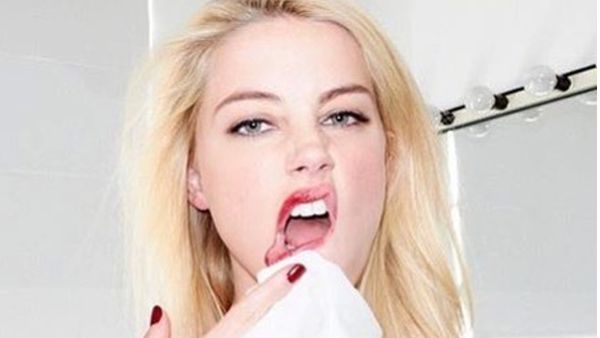 Putus dari Elon Musk, Amber Heard Telanjang Dada di Bali