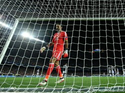 Seperti inilah ekspresi Buffon setelah gawangnya dibobol Messi. Foto: Albert Gea/Reuters