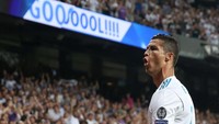 Seperti biasa, Ronaldo merayakan golnya itu dengan gaya khasnya. Foto: Sergio Perez/Reuters
