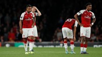 Ekspresi para pemain Arsenal setelah gawangnya kebobolan. Foto: David Klein/Reuters