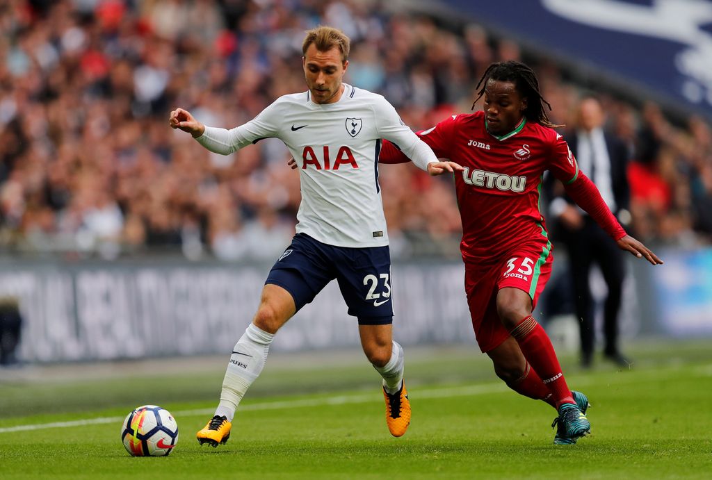 Soccer Football - Premier League - Tottenham Hotspur vs Swansea City - Wembley Stadium, London, Britain - September 16, 2017   Tottenham's Christian Eriksen in action with Swansea City's Renato Sanches        REUTERS/Eddie Keogh    EDITORIAL USE ONLY. No use with unauthorized audio, video, data, fixture lists, club/league logos or 