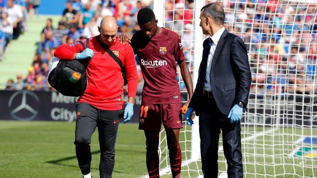 Ousmane Dembele diperkirakan harus istirahat empat bulan karena cedera hamstring. (
