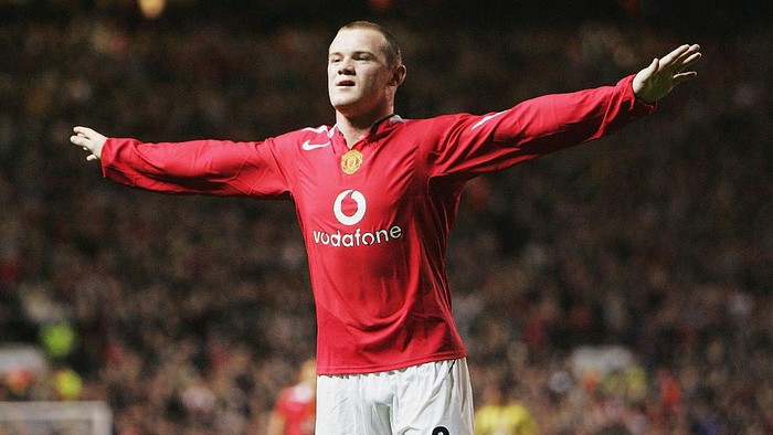Wayne Rooney, Golden Boy 2004 MANCHESTER, ENGLAND - SEPTEMBER 28: Wayne Rooney of Manchester United celebrates his second goal during the UEFA Champions League Group D match between Manchester United and Fenerbahce SK at Old Trafford on September 28, 2004 in Manchester, England. (Photo by Laurence Griffiths/Getty Images)
