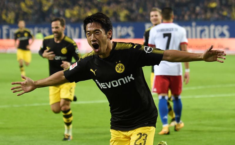 Soccer Football - Bundesliga - Hamburg SV vs Borussia Dortmund - Volksparkstadion, Hamburg, Germany - September 20, 2017 Borussia Dortmund's Shinji Kagawa celebrates scoring their first goal REUTERS/Fabian Bimmer DFL RULES TO LIMIT THE ONLINE USAGE DURING MATCH TIME TO 15 PICTURES PER GAME. IMAGE SEQUENCES TO SIMULATE VIDEO IS NOT ALLOWED AT ANY TIME. FOR FURTHER QUERIES PLEASE CONTACT DFL DIRECTLY AT + 49 69 650050