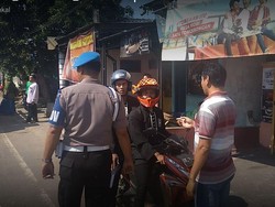 Polisi Tilang 150 Motor Konvoi saat Ziarah Suro