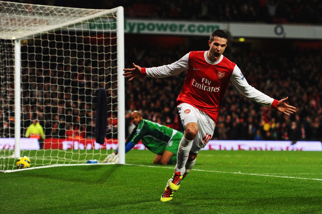LONDON, UNITED KINGDOM - JANUARY 22:  Robin Van Persie of Arsenal celebrates scoring his third goal in a hat trick during the Barclays Premier League match between Arsenal and Wigan Athletic at the Emirates Stadium on January 22, 2011 in London, England.  (Photo by Mike Hewitt/Getty Images)