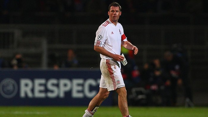 LYON, FRANCE - NOVEMBER 04:  Jamie Carragher of Liverpool walks off dejected after his side conceded a  last minute equaliser was conceded during the Lyon v Liverpool UEFA Champions League Group E match at the Stade de Gerland on November 4, 2009 in Lyon, France.  (Photo by Michael Steele/Getty Images)