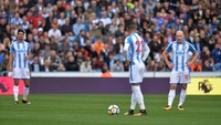 Meski berstatus tim promosi, Huddersfield sebenarnya punya rekor yang cukup oke di kandang. Sebelum perjamuan terhadap Tottenham mereka tak terkalahkan di kandang pada tiga laga dan cuma kemasukan satu kali. (REUTERS/Peter Powell)