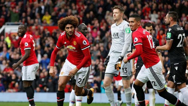 Marouane Fellaini cetak dua gol ke gawang Crystal Palace, Sabtu (30/9).