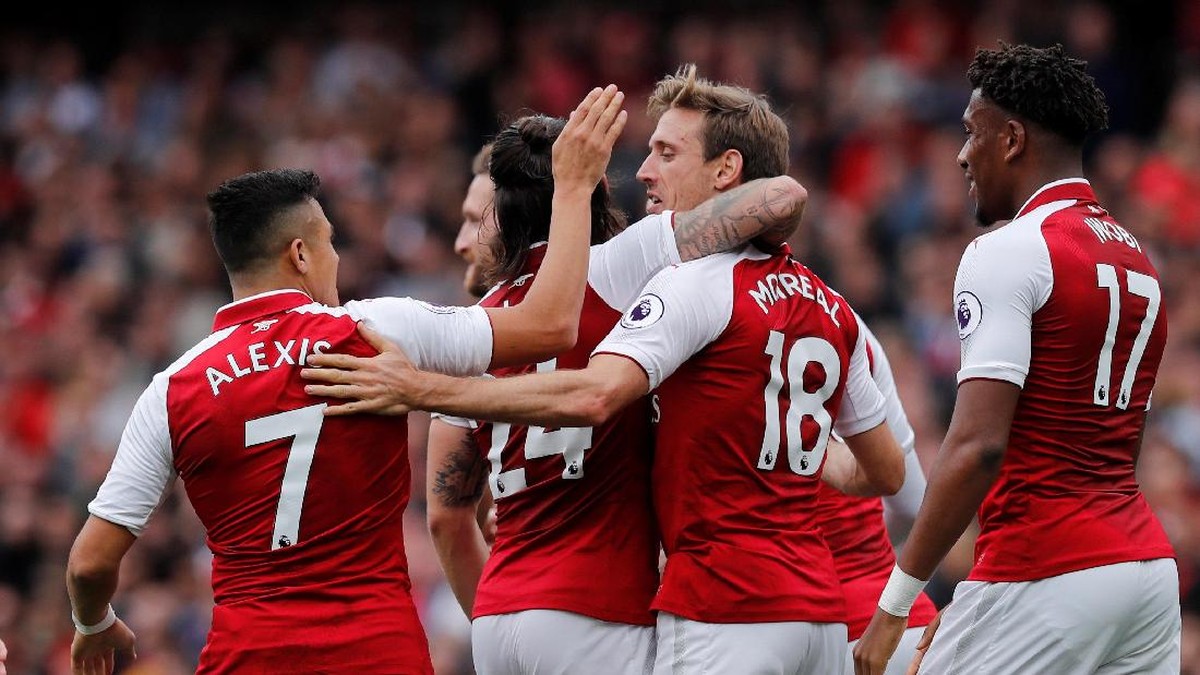 Arsenal merayakan gol pertama ke gawang Brighton & Hove Albion dalam lanjutan Premier League. (Tony OBrien /Reuters)