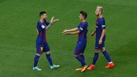Lionel Messi memperbesar keunggulan tim tuan rumah lewat golnya pada menit ke-70. Foto: Albert Gea/Reuters