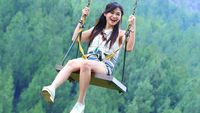 Foto: Gaya Liburan Tante Cantik Awet Muda Puspa Dewi
