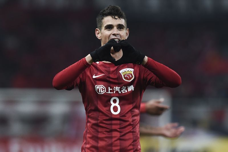  Oscar #8 of Shanghai SIPG celebrates after scoring his team's second goal during the AFC Champions League 2017 Group F match between Shanghai SIPG and Western Sydney Wanderers at Shanghai Stadium on February 28, 2017 in Shanghai, China.  (Photo by Visual China/Getty Images)