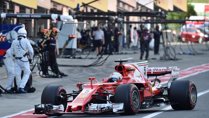 Pebalap Ferrari Sebastian Vettel gagal finis di GP Jepang (Kazuhiro Nogi/Pool/Reuters)